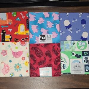 6 different  fat quarter fabrics. 18"x21".great for sewing